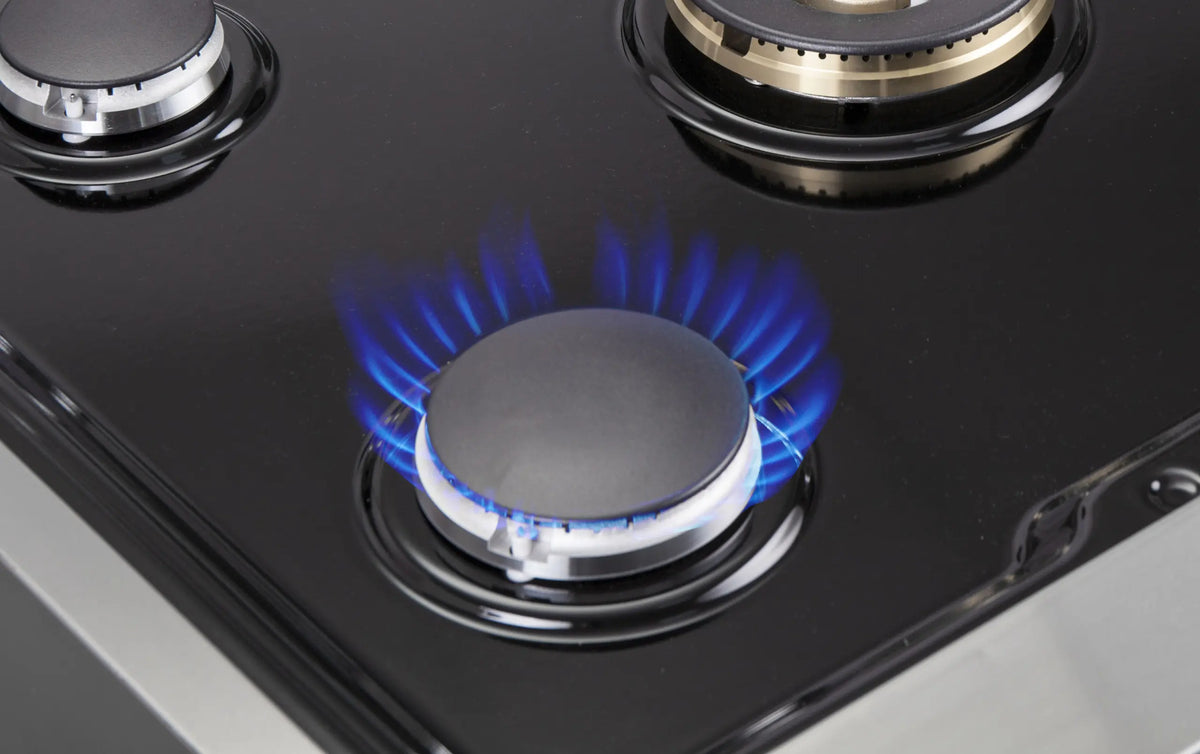Black glass cooktop dual burner with blue gas flames