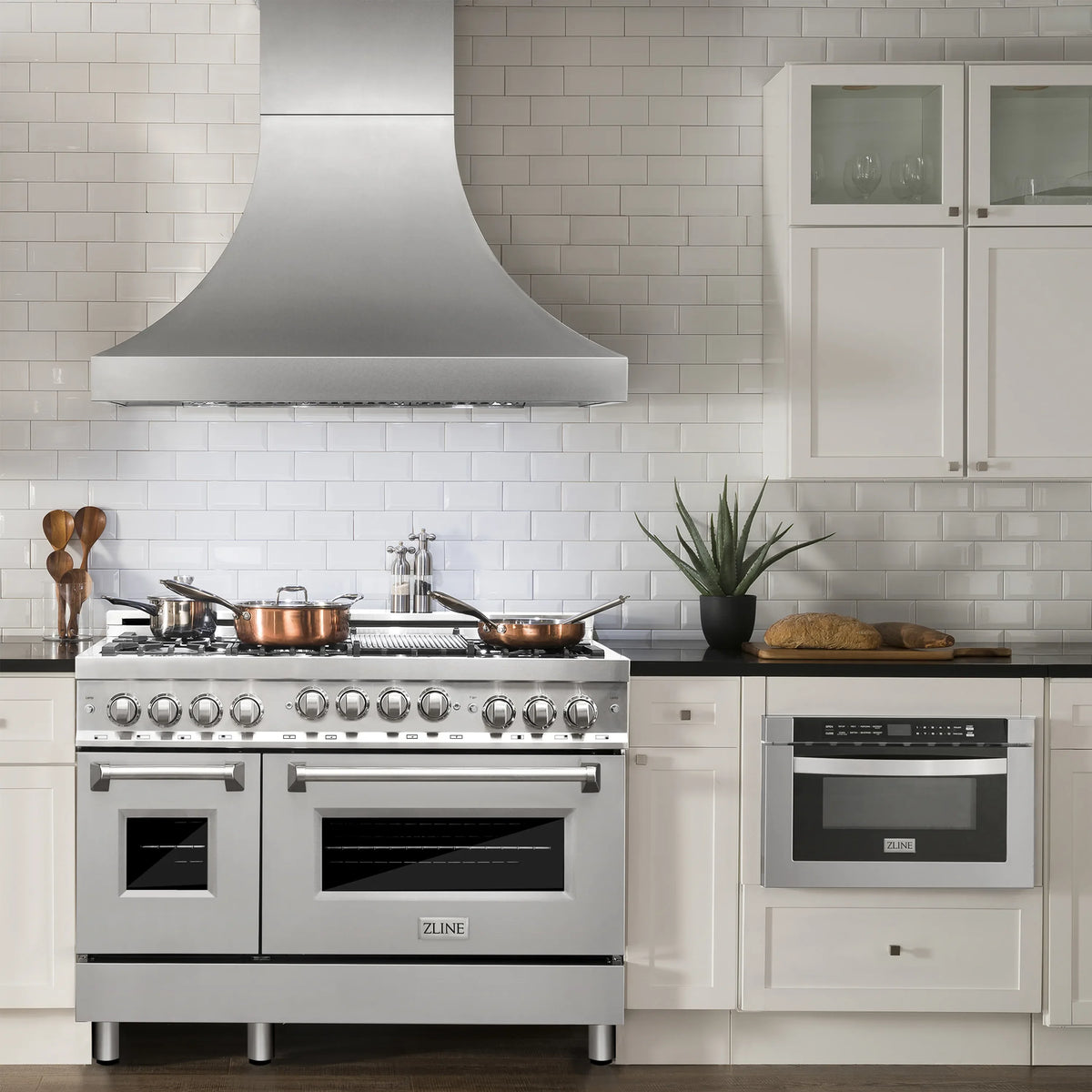 ZLINE 48-inch Legacy Series Dual Fuel Range with 7 Gas Brass Burners and 6.0 Cu. Ft. Electric Double Oven in Stainless Steel in a kitchen