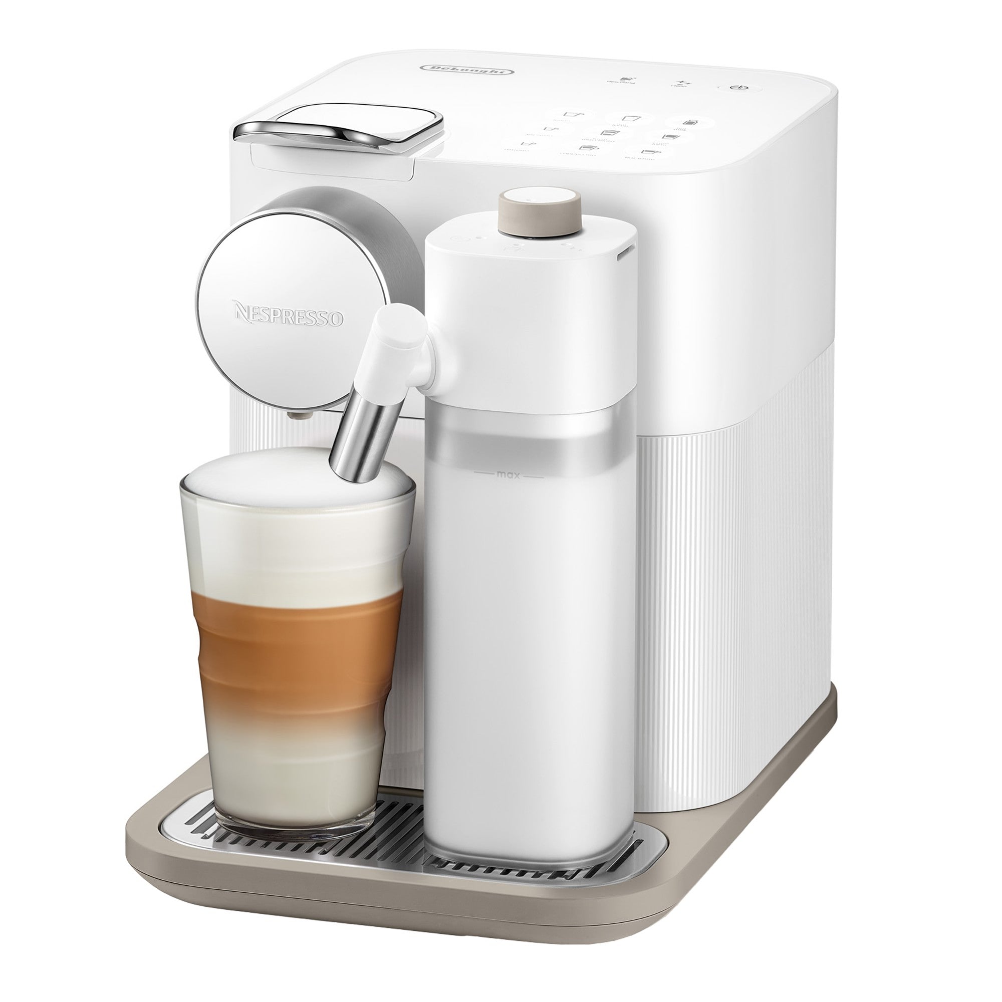White Nespresso coffee machine with cup and tall milk container on drip tray