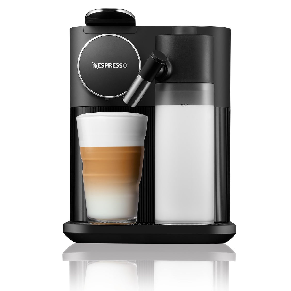 Black espresso machine with frothing nozzle, white tank, and mug with layered coffee