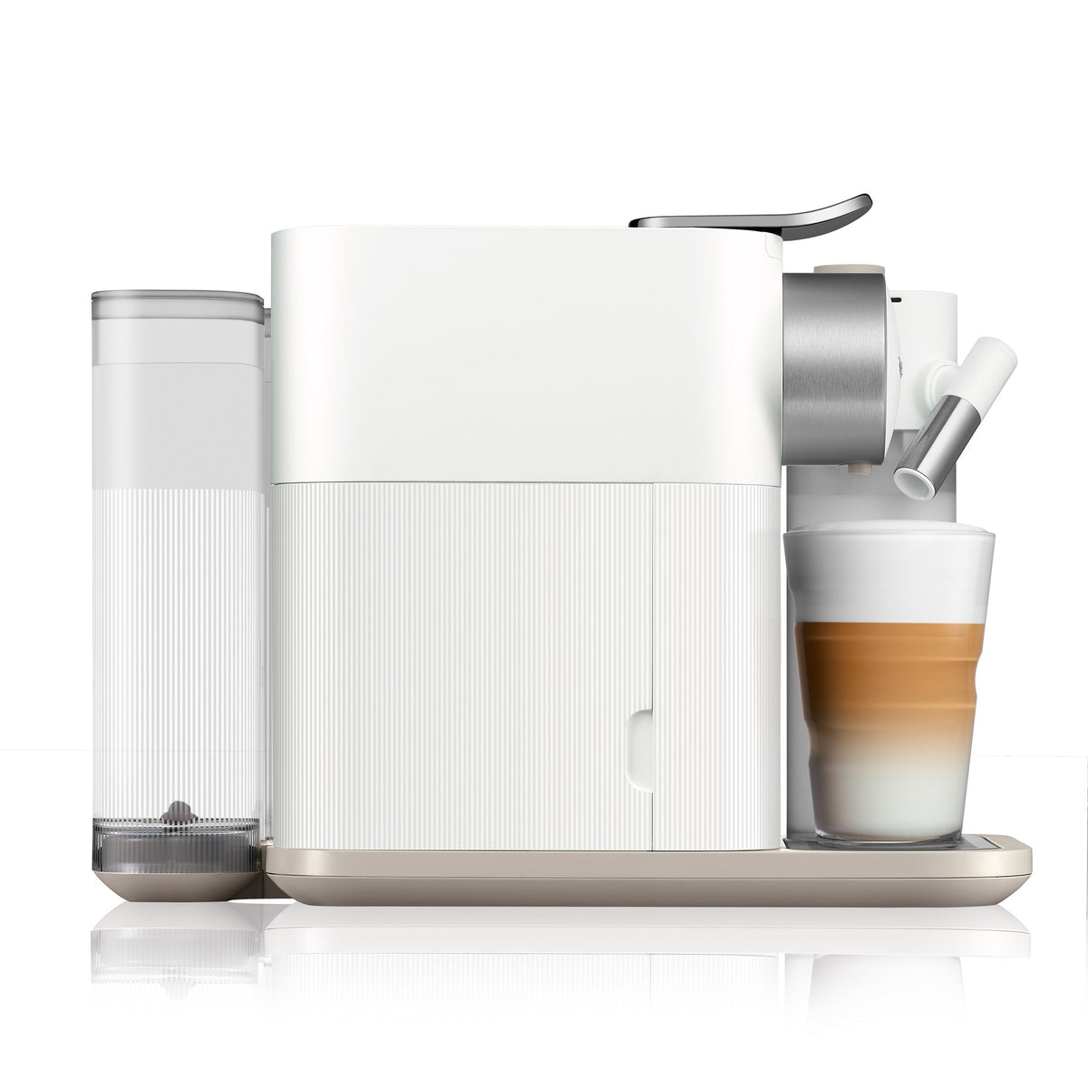 White Nespresso coffee machine side view with frothing spout and cup