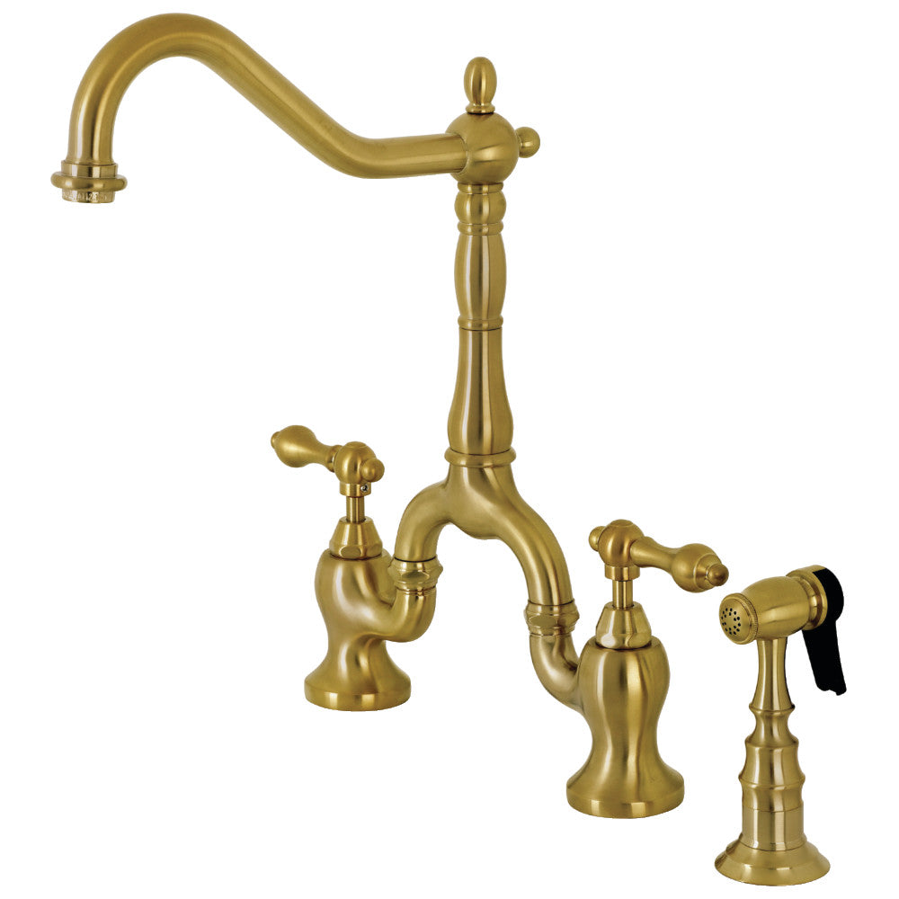 Brushed brass bridge kitchen faucet with side sprayer and curved spout
