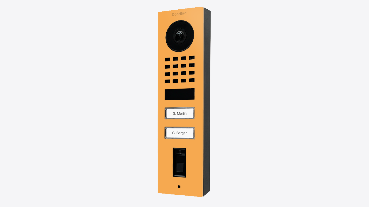 Saffron yellow surface-mount video door station with camera and name buttons
