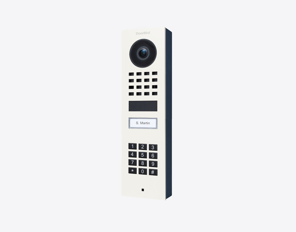 DoorBird D1101KV surface-mount IP video door station in traffic white with camera and keypad