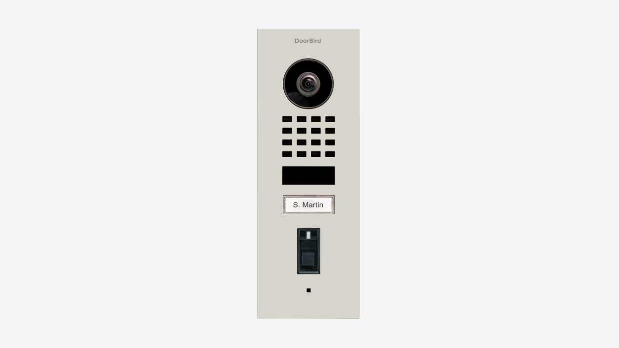Grey flush-mount IP video door station front view with camera lens and keypad