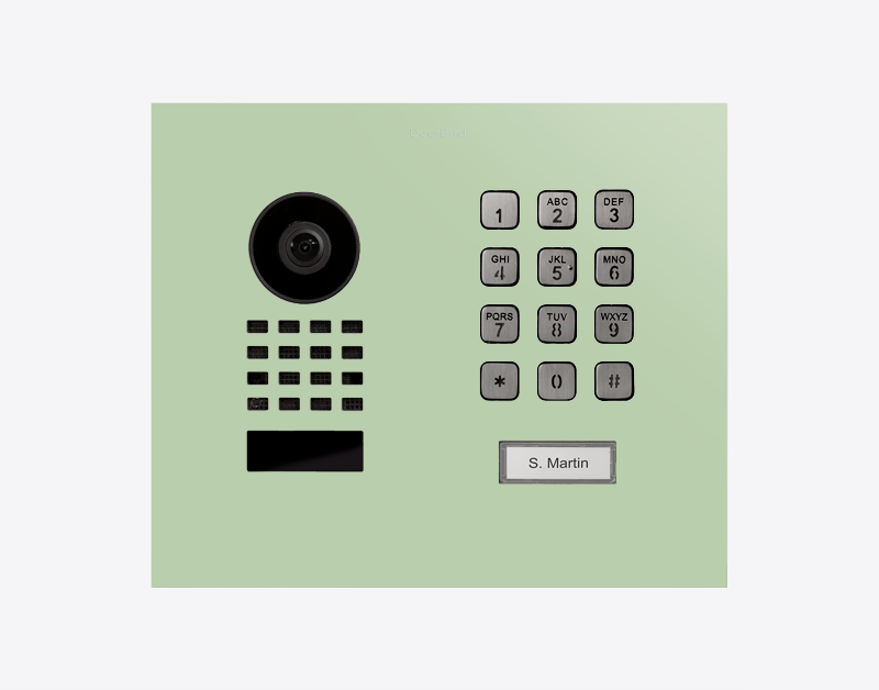 Pastel green flush-mount IP video door station with camera lens and numbered keypad