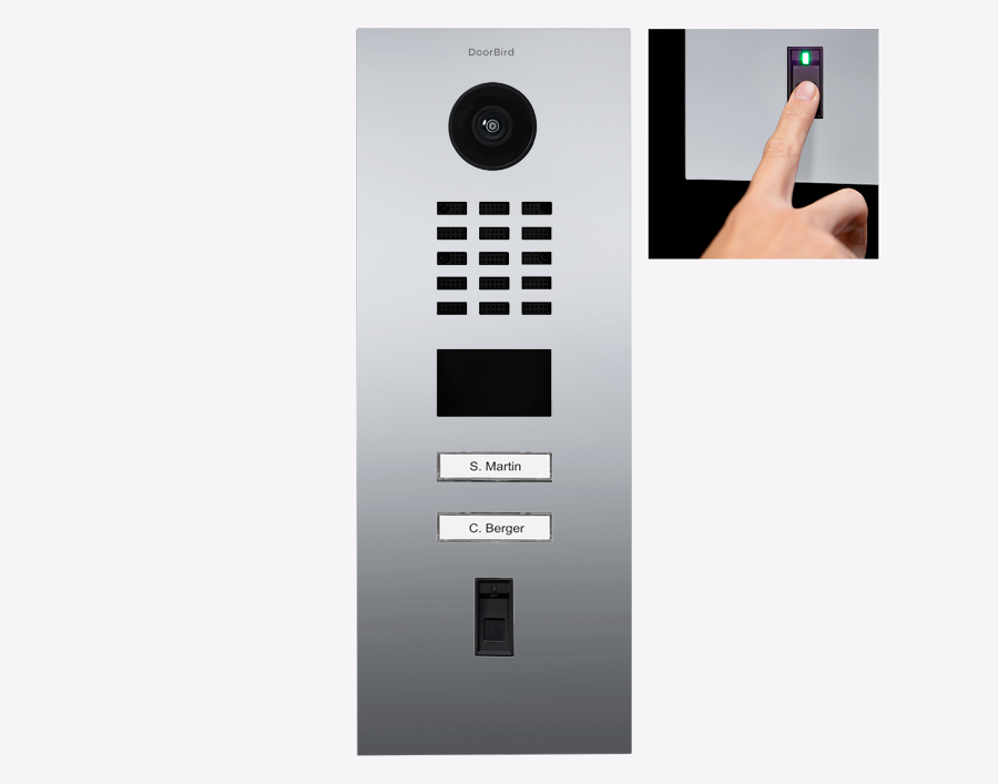 Chrome video door station with camera lens, keypad call buttons, and nameplate slots