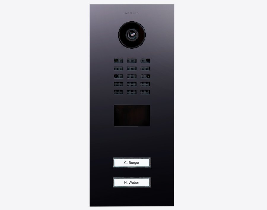 DoorBird titanium video door station with camera, keypad grid, and two name plates
