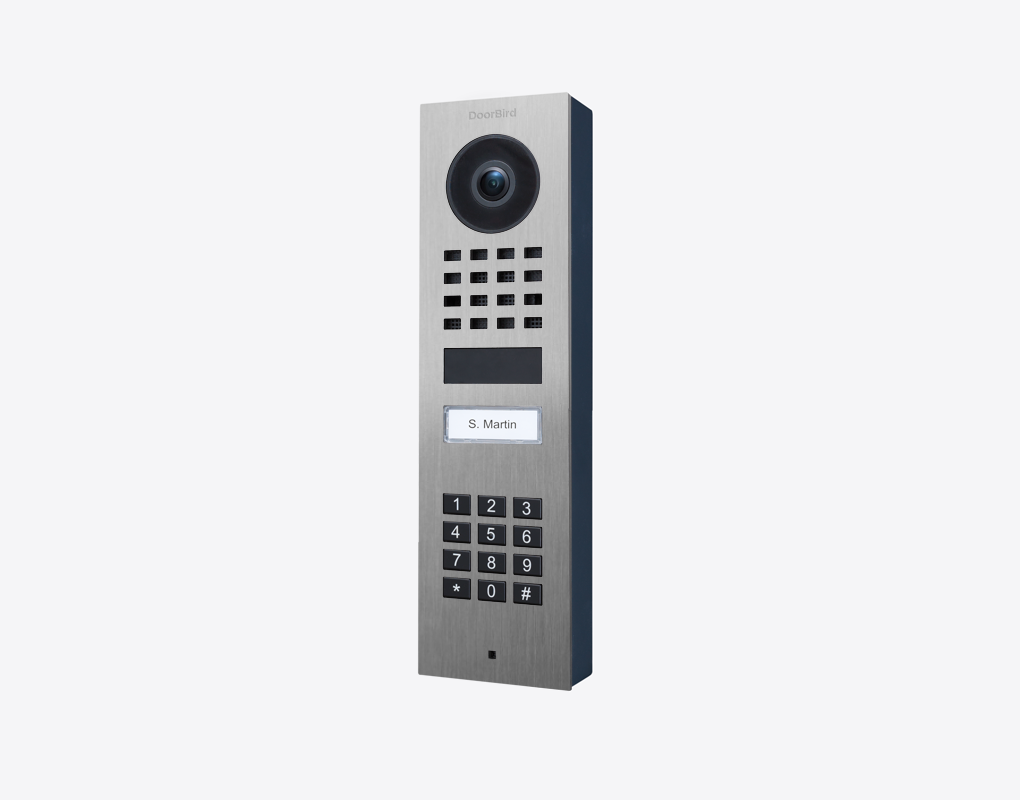 Stainless steel surface-mount video door station with camera lens, keypad, and call button
