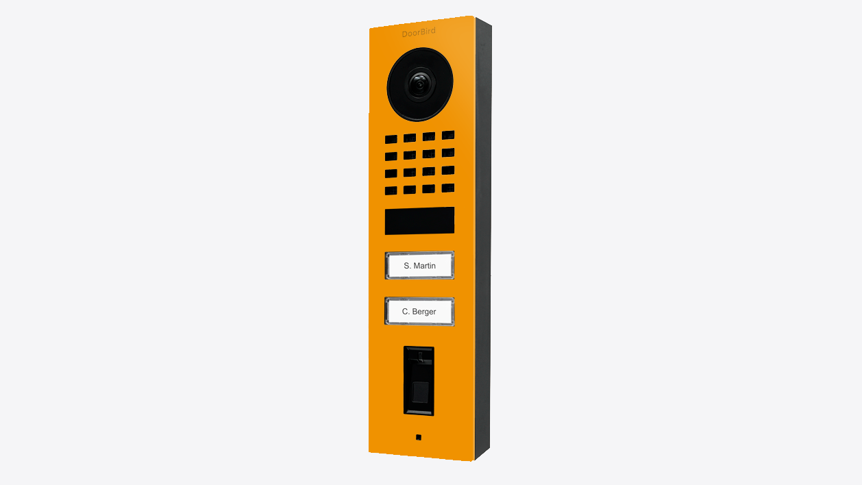 Sun yellow video door station with camera lens, keypad grid, and call button