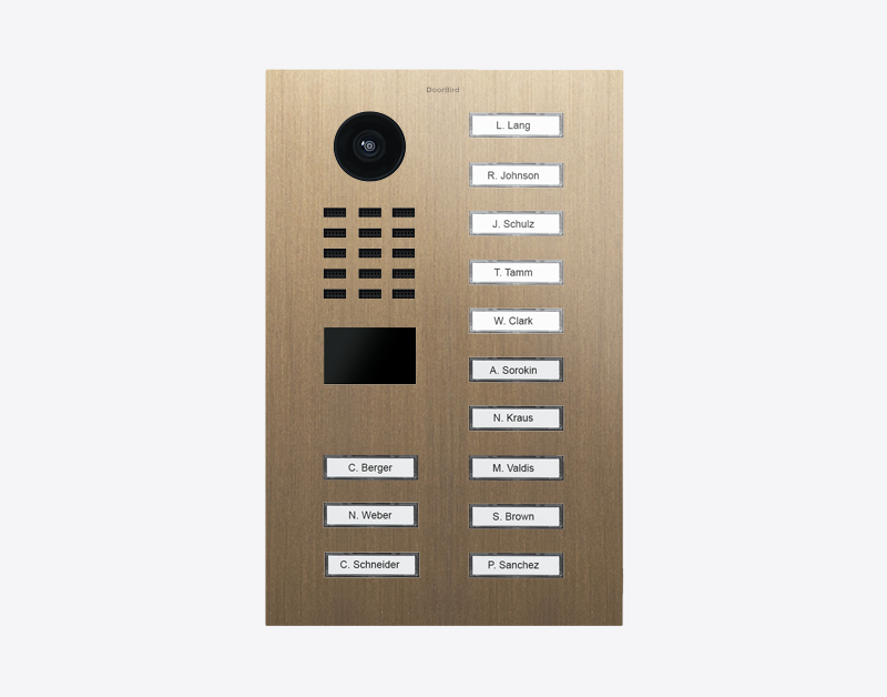 DoorBird video door station with call buttons in burnished brass