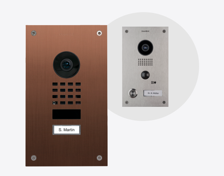Bronze DoorBird IP video door station with camera lens, speaker grille, and nameplate