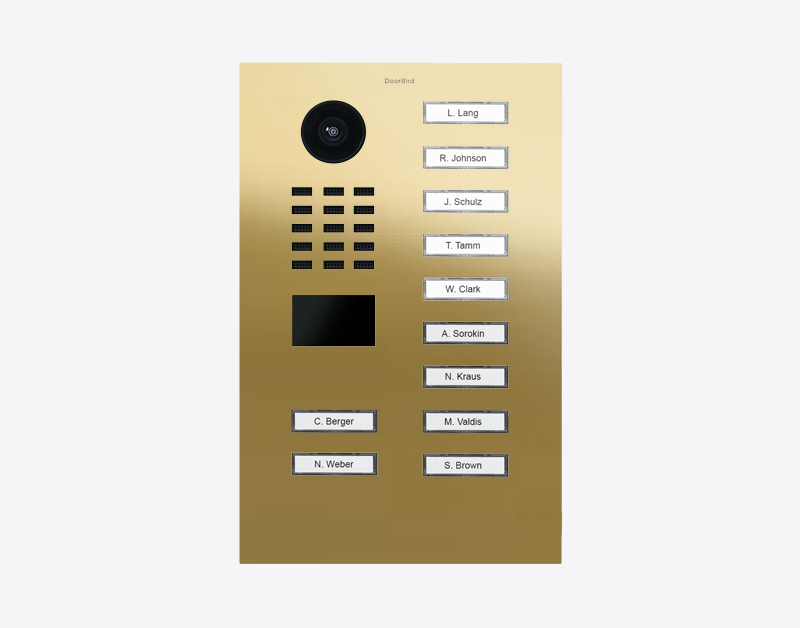 Brass IP video door station with round camera lens and 11 labeled call buttons