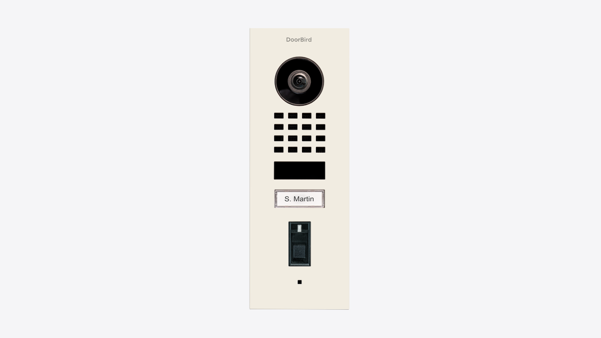 DoorBird pure-white flush-mount IP video door station front view with camera and keypad