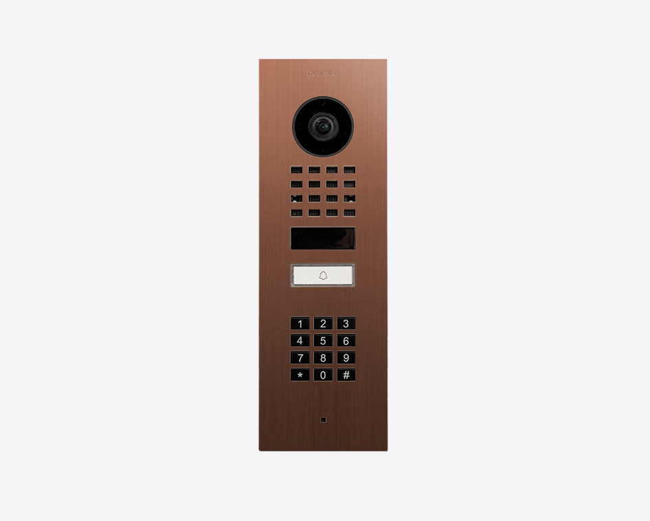 DoorBird video door station in bronze with camera lens, keypad, and call button