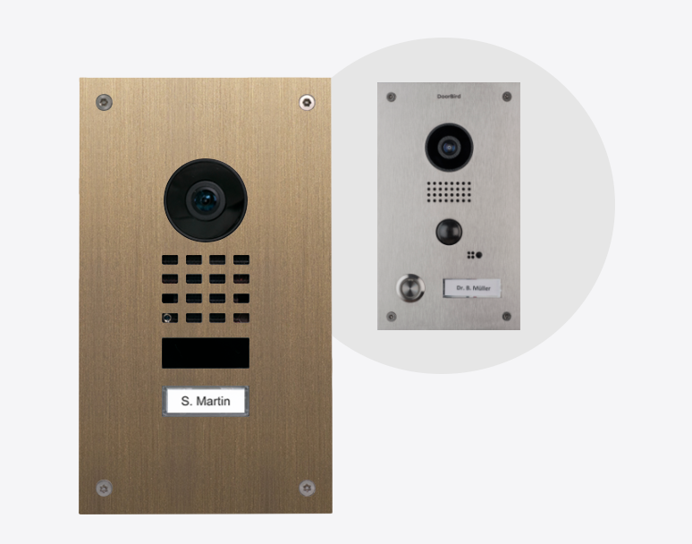 Real burnished brass video door station with camera, keypad, and call button