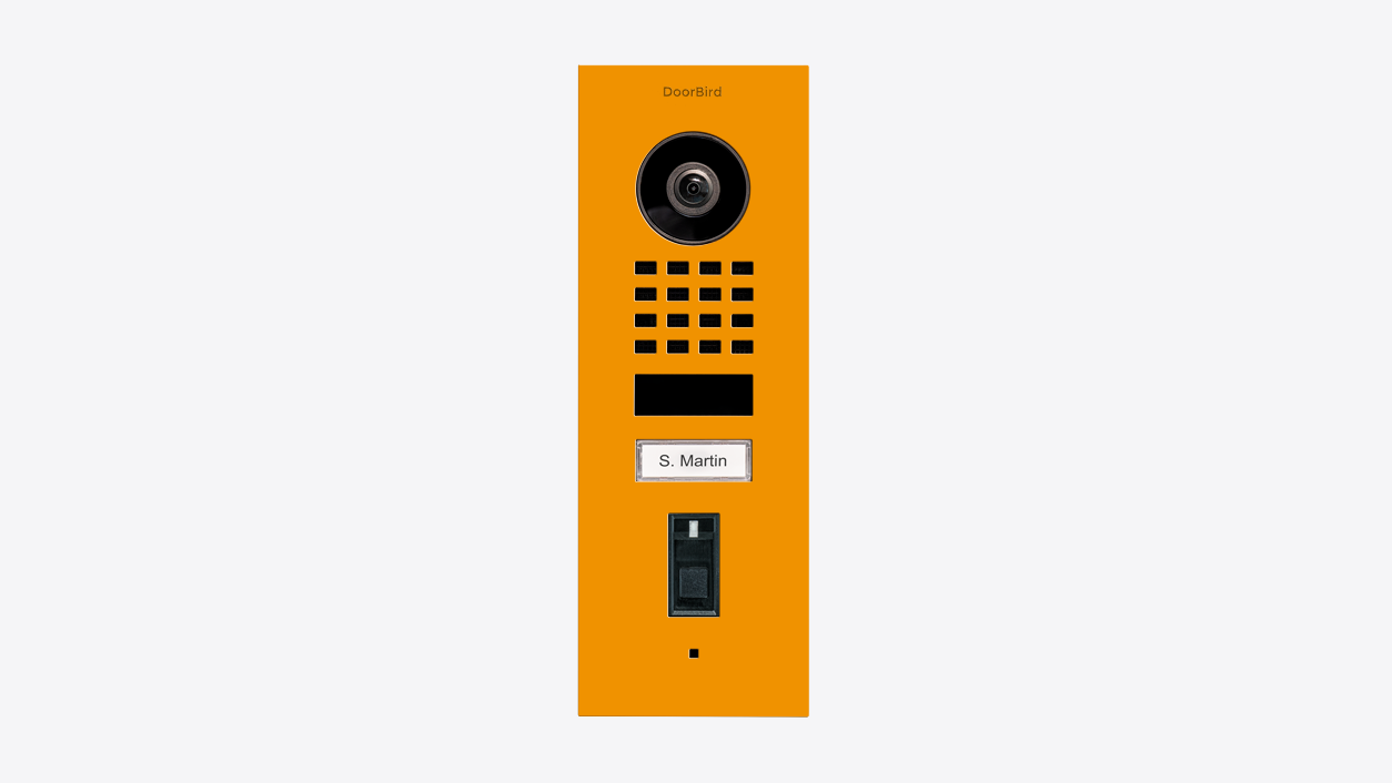 DoorBird flush-mount video door station in sun yellow with camera and keypad