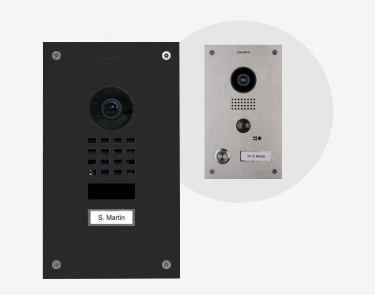 Graphite black video door station with camera lens, keypad, and S. Martin nameplate