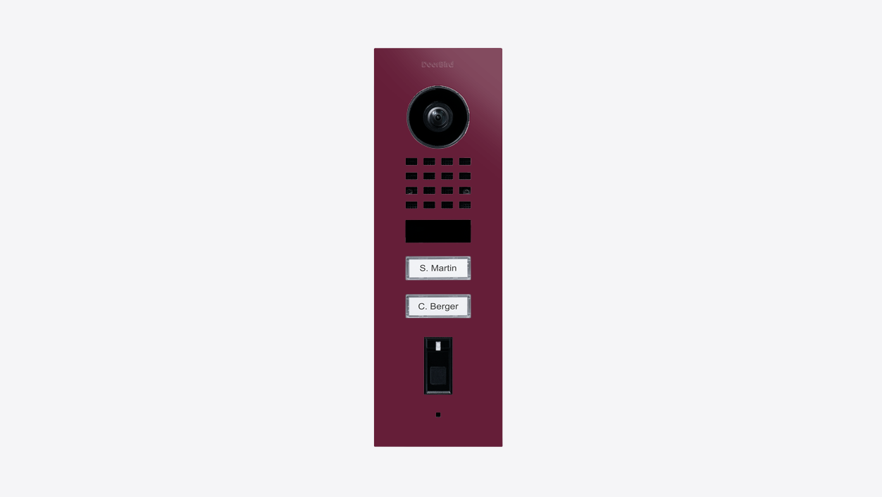 Claret violet DoorBird IP video door station with camera, speaker grille, and nameplates