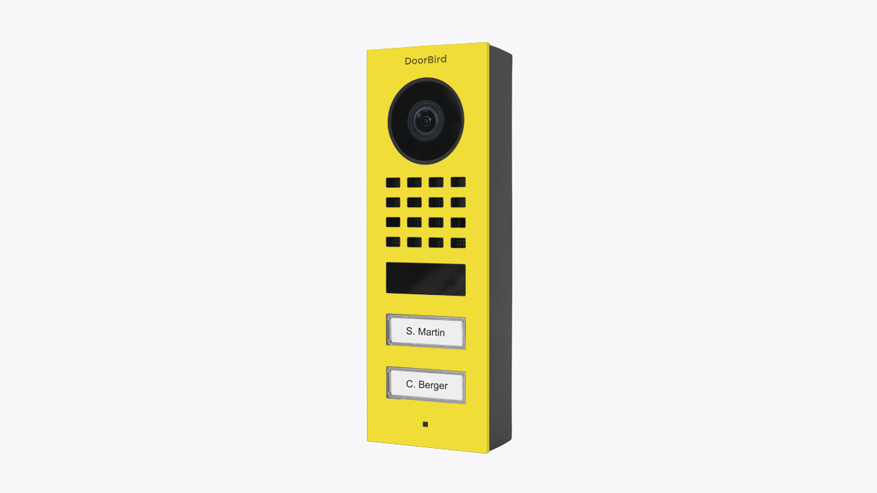 Sulfur yellow DoorBird surface-mount video door station with camera, grille and two name buttons