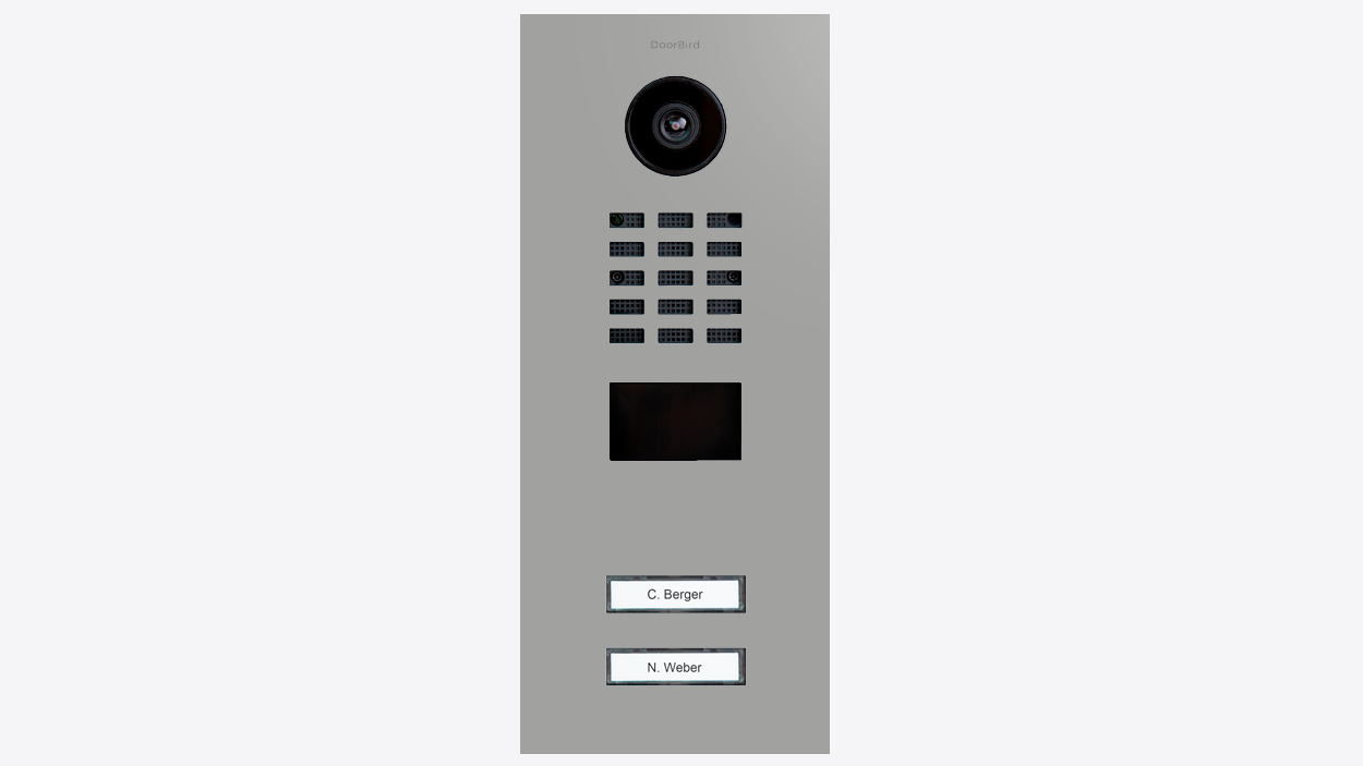 Video door station panel with camera lens, call button grid, and two label areas