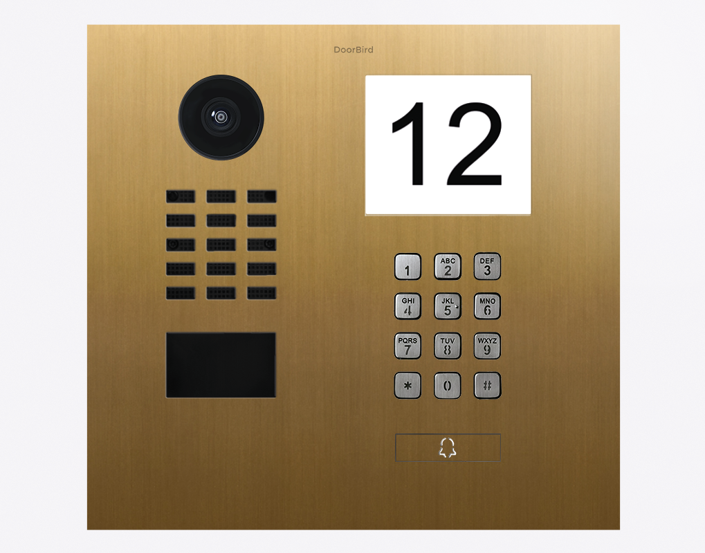 DoorBird IP video door station in gold, keypad and camera with number 12 display