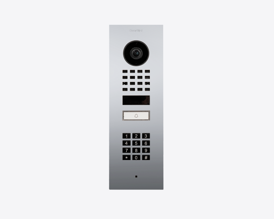 DoorBird flush-mount IP video door station in chrome with camera lens, call button and keypad