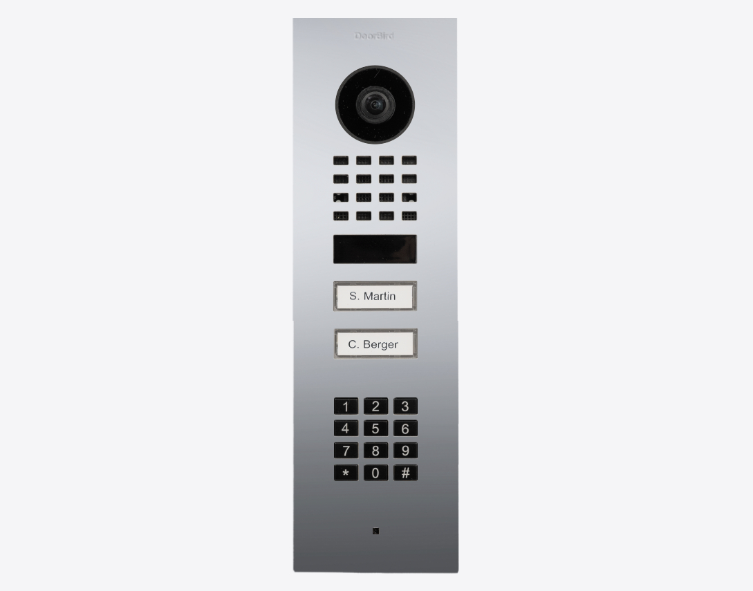 Chrome flush mount IP video door station with camera lens, keypad, and two call buttons.