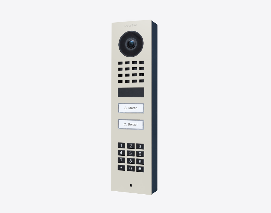 DoorBird IP video door station with camera, keypad, and two call buttons in grey/white