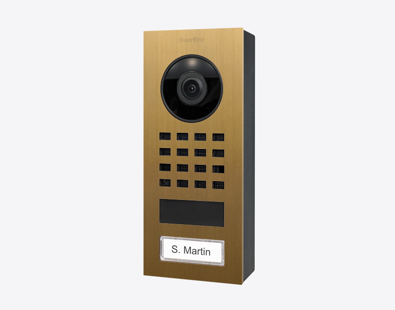 DoorBird video door intercom in gold with camera, keypad, and call button; nameplate S. Martin