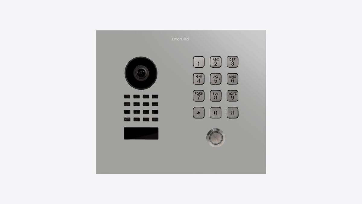 DoorBird flush-mount IP video door station faceplate with camera, numeric keypad, call ring