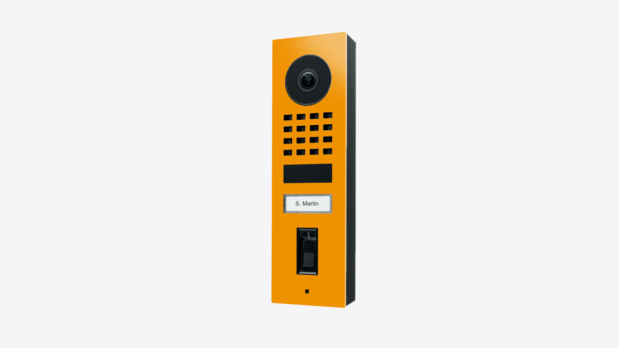 Sun yellow wall-mounted video door station with camera, keypad, and nameplate
