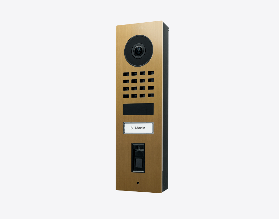 DoorBird fingerprint video door station in gold metal with camera lens and call panel