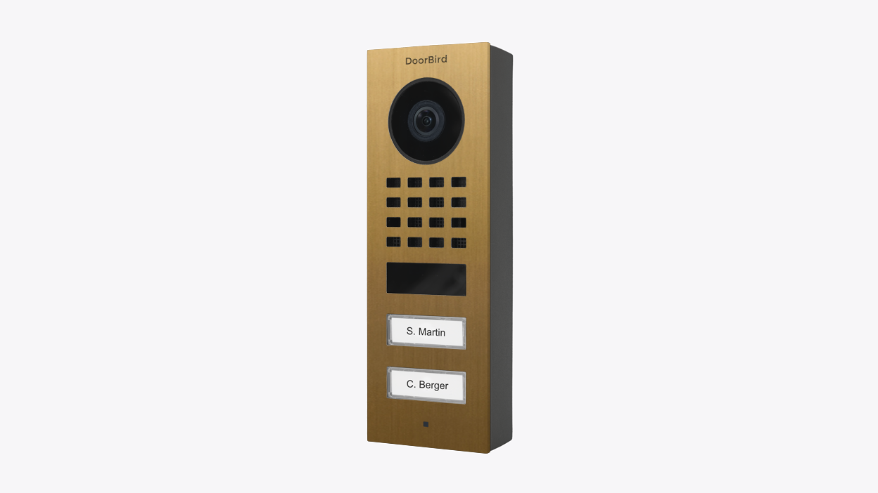 Gold-toned DoorBird D1102V surface-mount IP video door station with camera and keypad