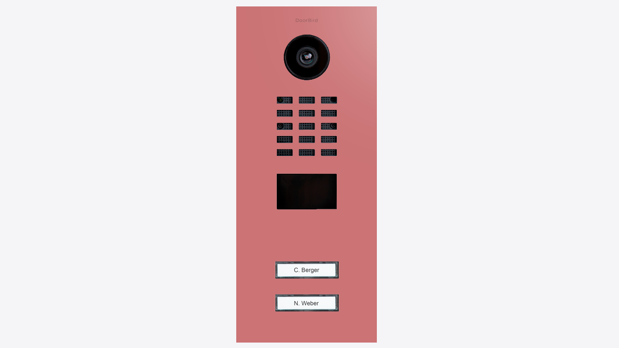 Antique pink video door station with camera lens, keypad grid, and two call buttons