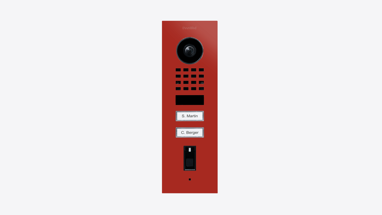 Flame red video door station with camera lens, speaker grille, and two nameplates.