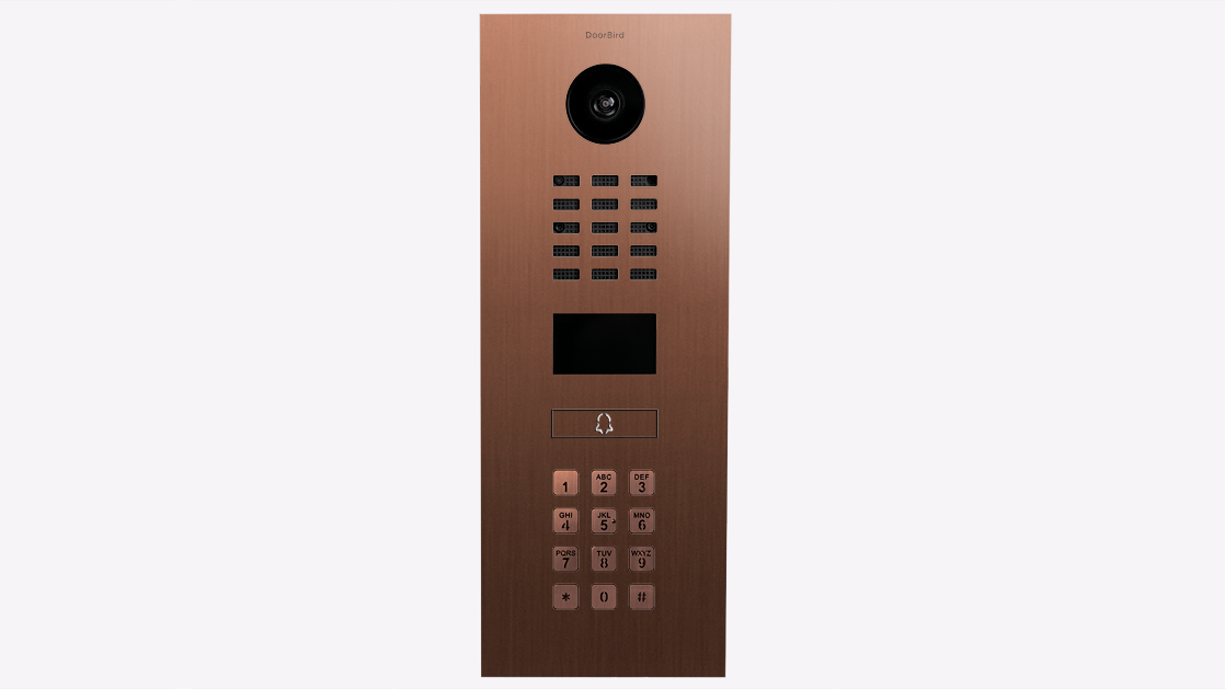 Bronze DoorBird IP video door intercom panel with camera lens, speaker grille, and keypad