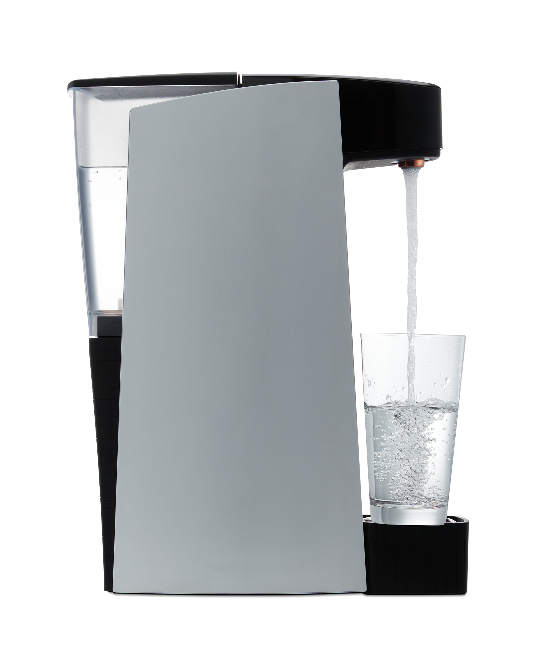 Countertop sparkling water maker with tall glass and carbonated water pour, black and silver body