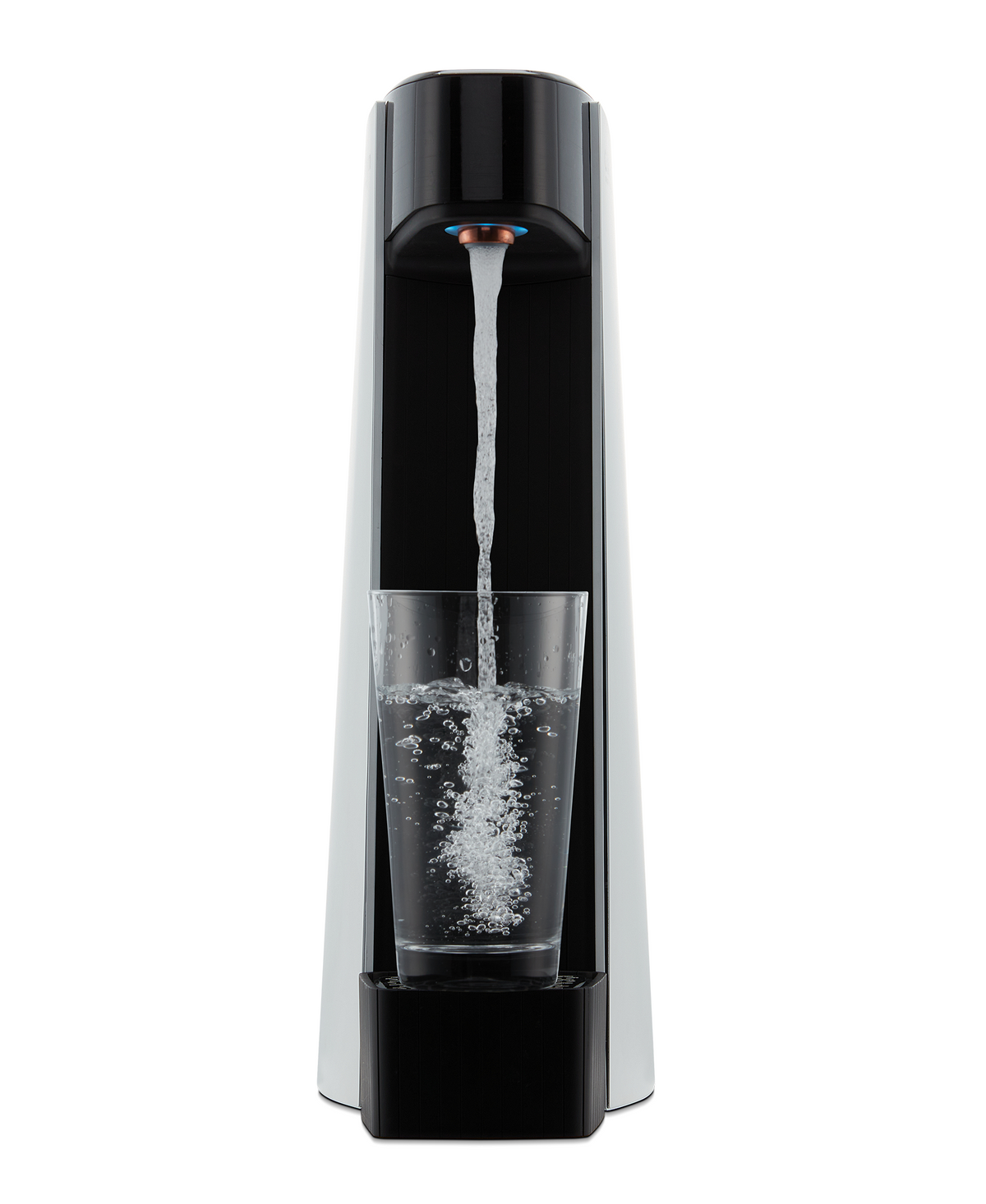 Silver and black sparkling water maker with water stream above a clear glass