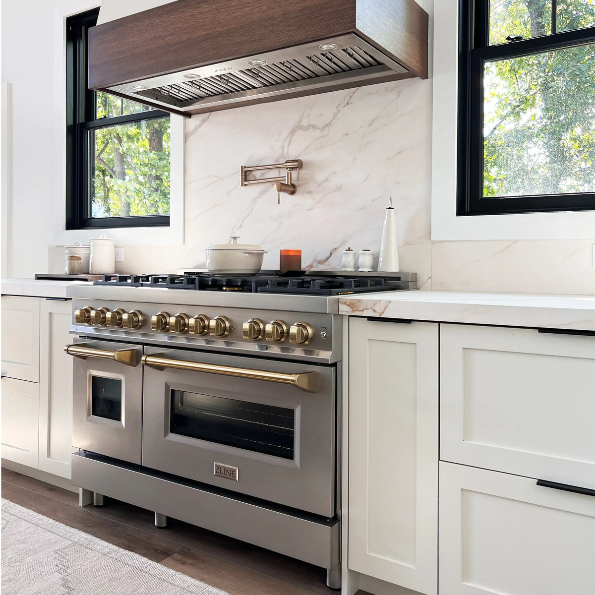 ZLINE Legacy Series Autograph Edition 48-inch Dual Fuel Range with Gas Stove and 6.0 Cu. Ft. Electric Oven in Stainless Steel with Champagne Bronze Accents in a kitchen