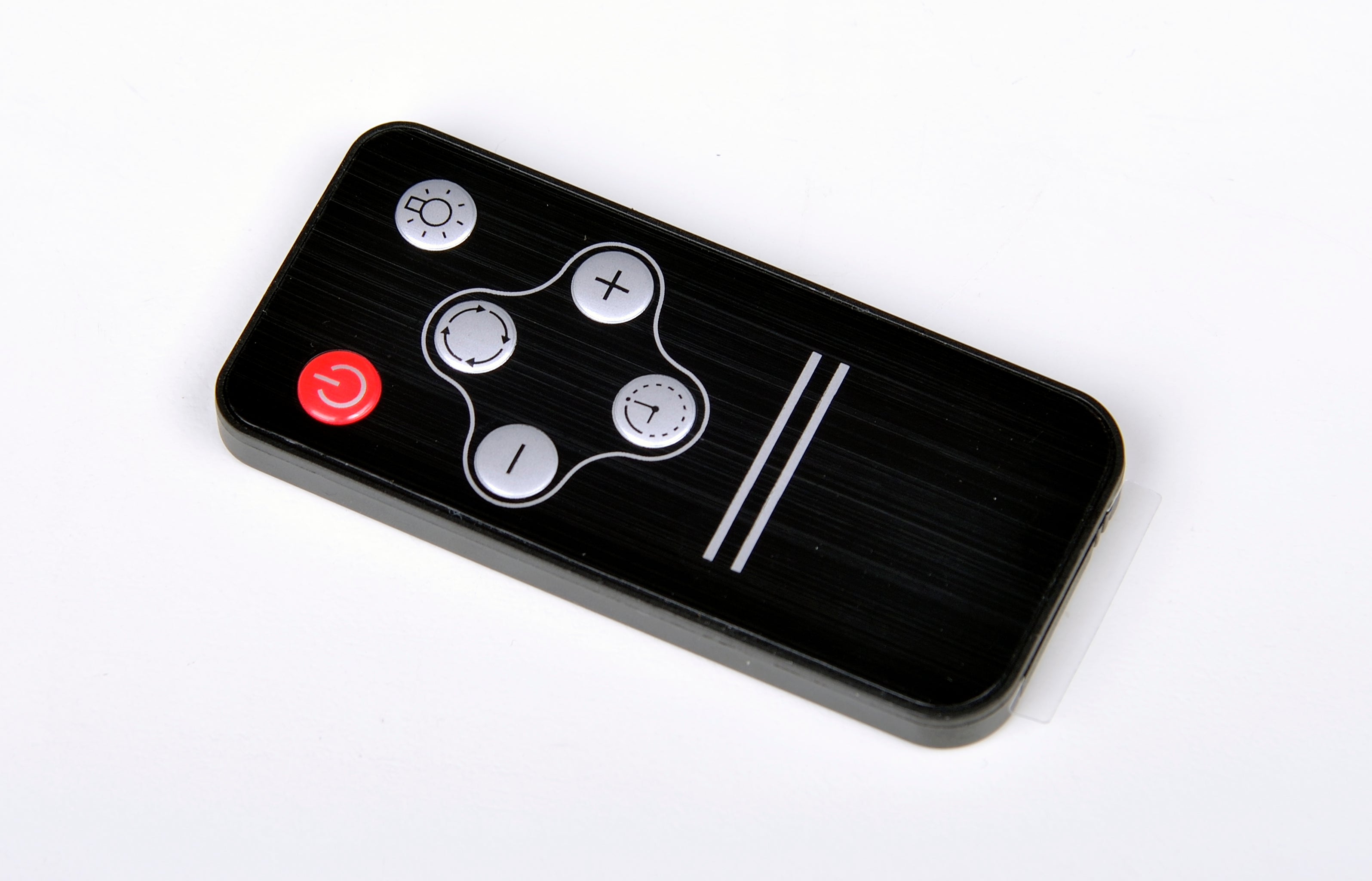 Black range hood remote controller, angled view, with red power and plus/minus buttons