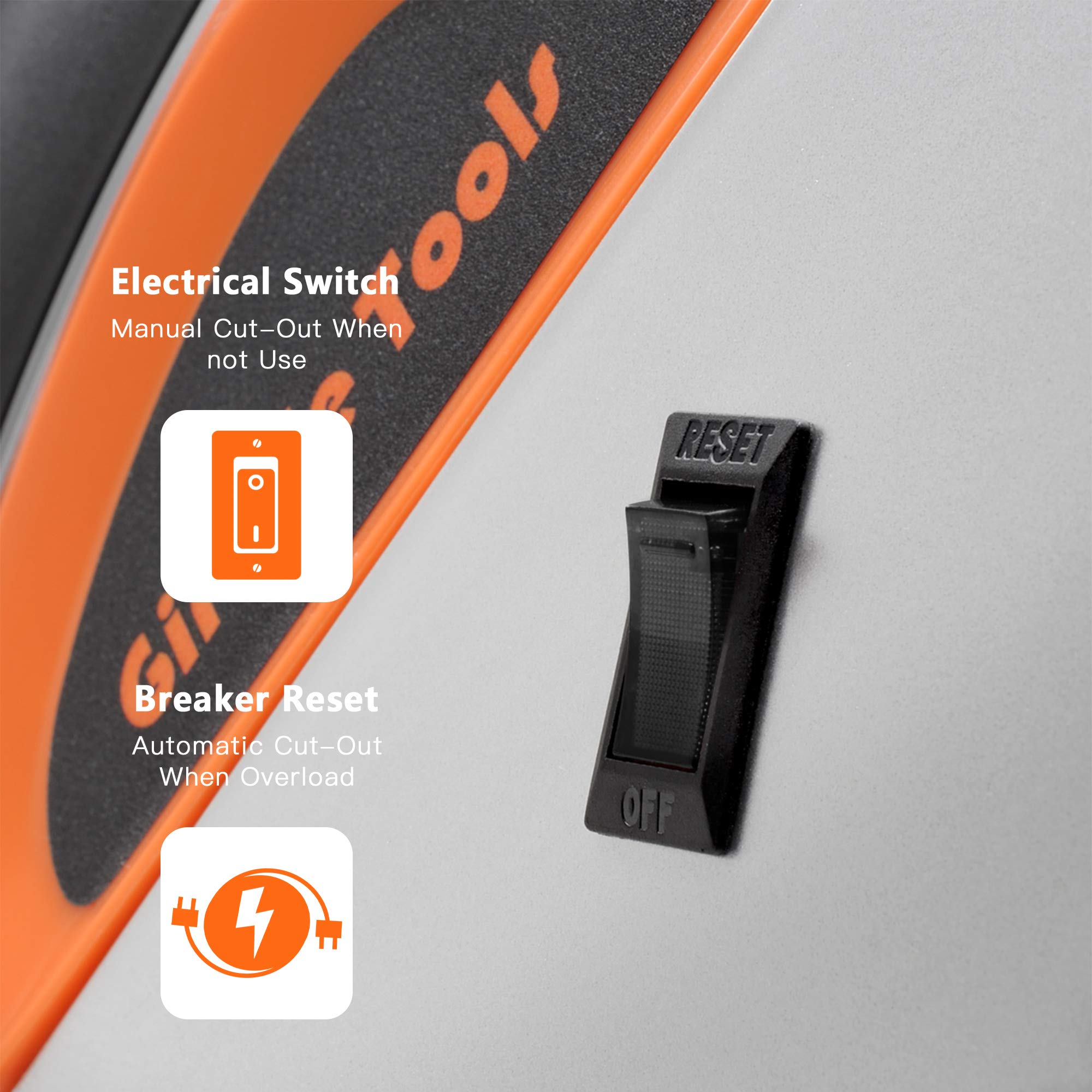 Retractable extension cord reel close-up of breaker reset switch area and orange control label.
