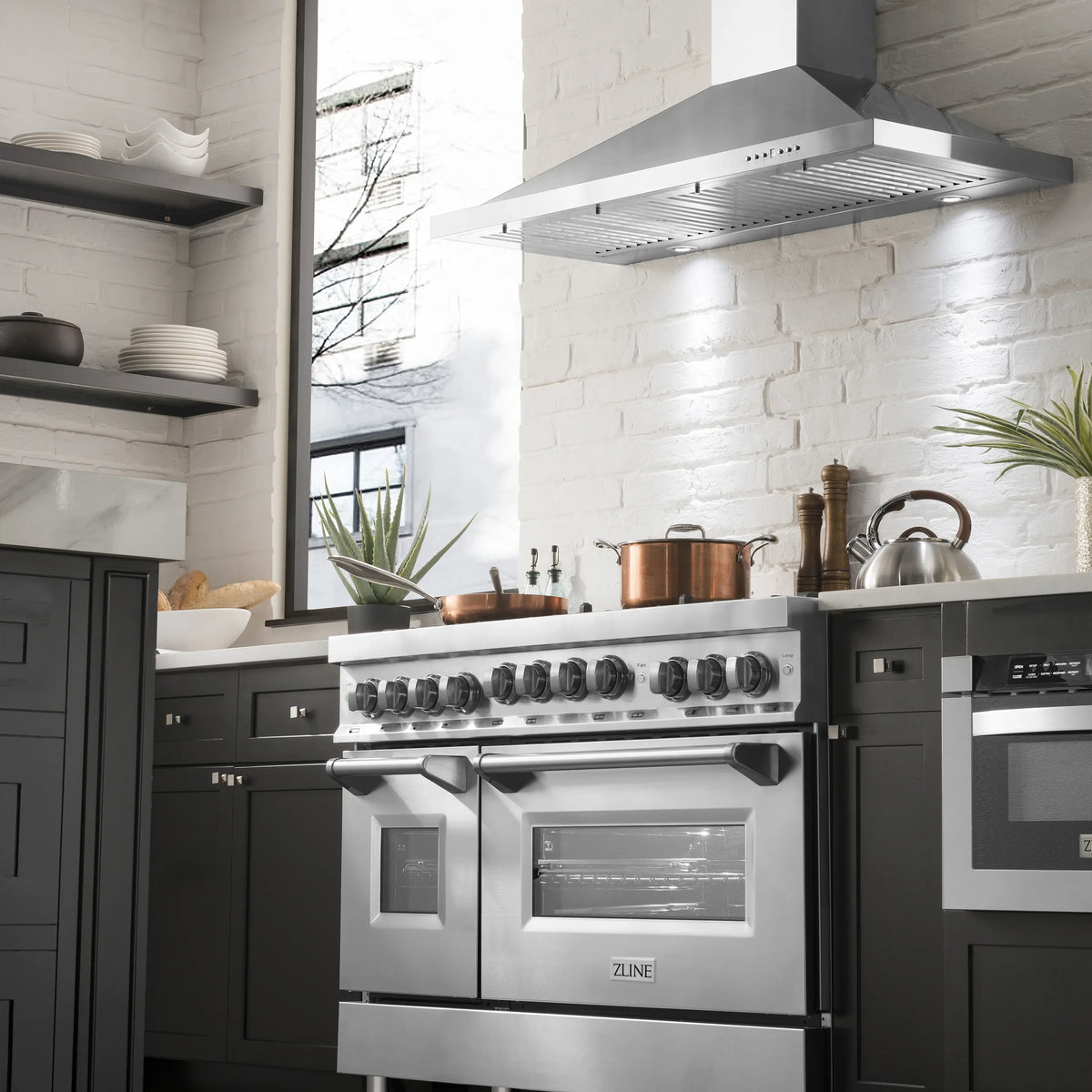 ZLINE 48-inch Legacy Series Dual Fuel Range with 7 Gas Brass Burners and 6.0 Cu. Ft. Electric Double Oven in Stainless Steel in a kitchen