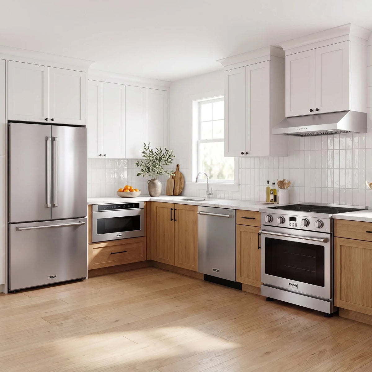 Thor Kitchen A-Series stainless steel kitchen with a 30-inch electric range, under-cabinet hood, French door refrigerator, dishwasher and microwave drawer