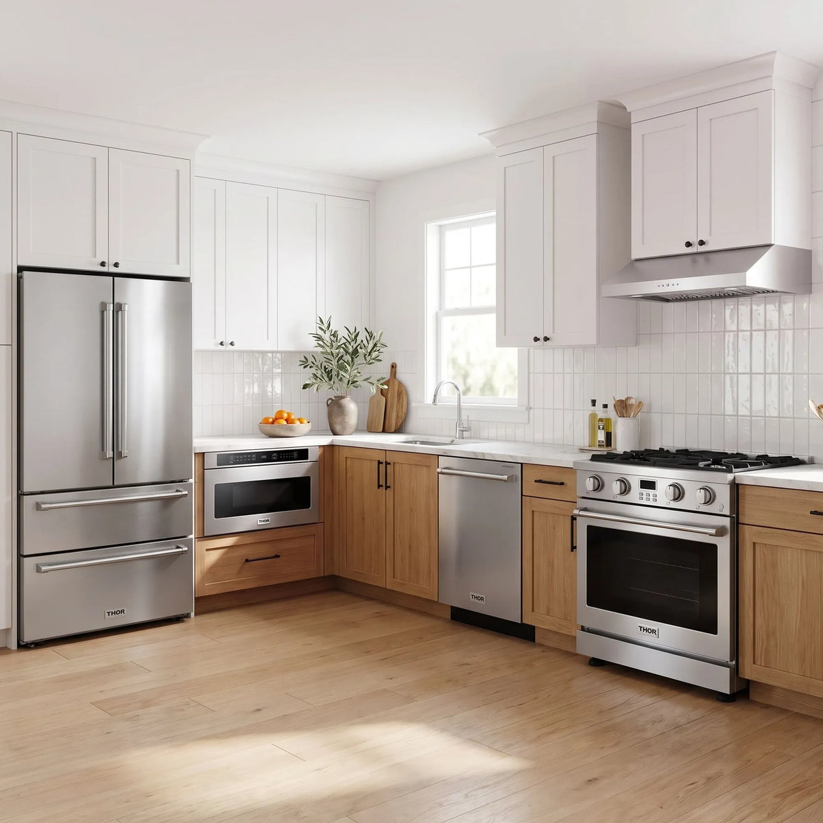 Thor Kitchen A-Series stainless steel kitchen with a 30-inch gas range, under-cabinet hood, French door refrigerator, dishwasher and microwave drawer