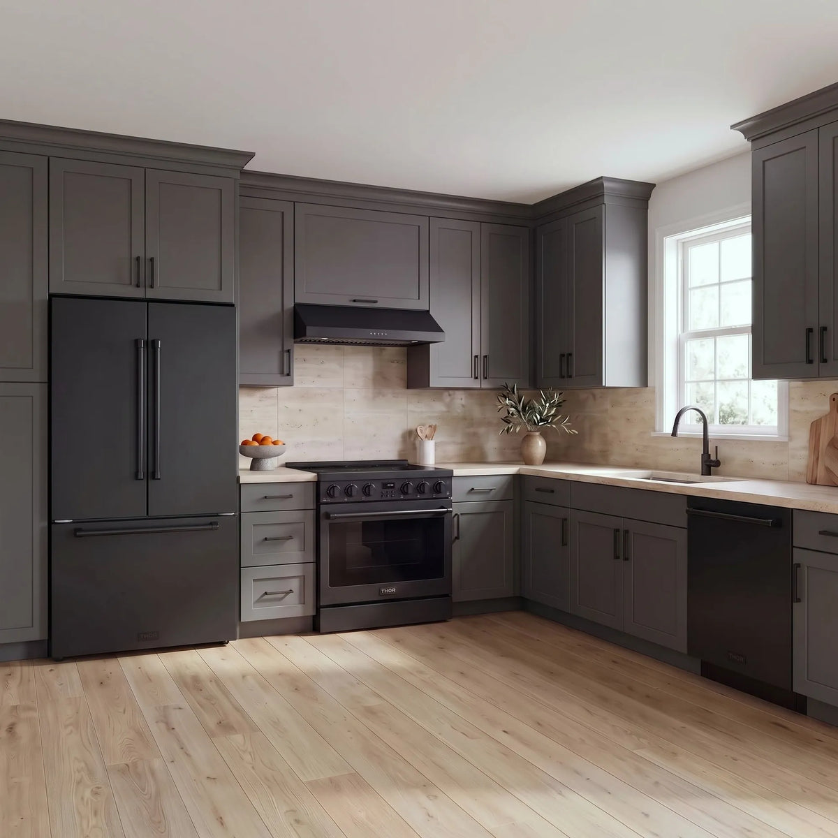 Thor Kitchen A-Series black kitchen with a 36-inch electric range, under-cabinet hood, French door refrigerator, dishwasher