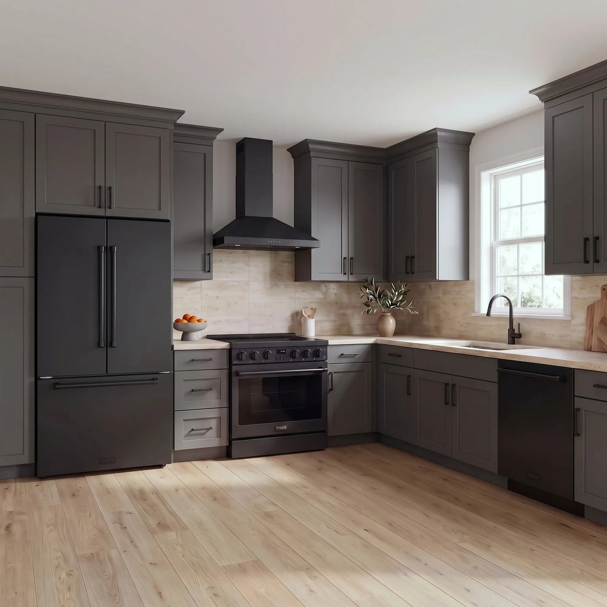 Thor Kitchen A-Series black kitchen with a 36-inch electric range, wall-mount chimney hood, French door refrigerator, dishwasher