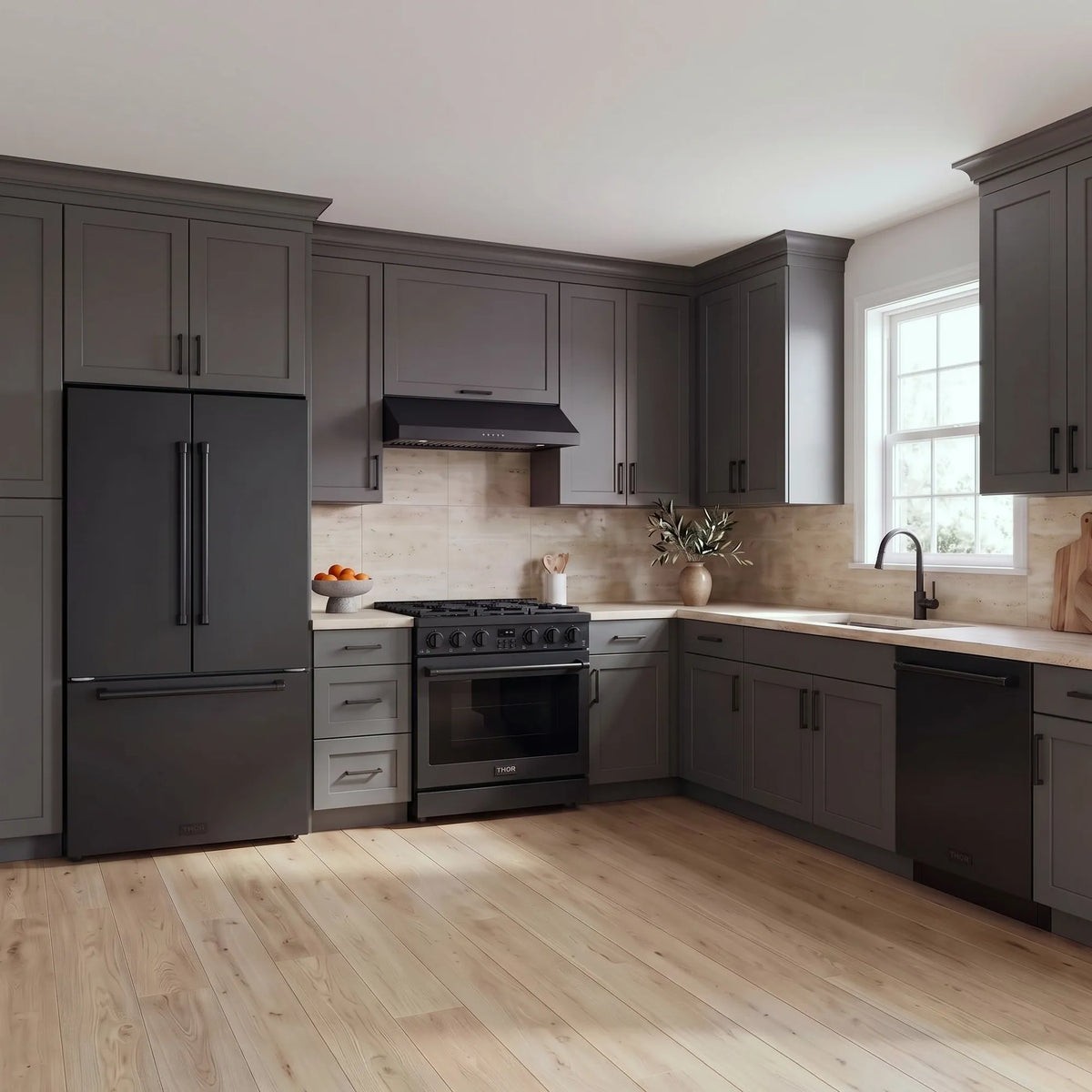 Thor Kitchen A-Series black kitchen with a 36-inch gas range, under-cabinet hood, French door refrigerator, dishwasher