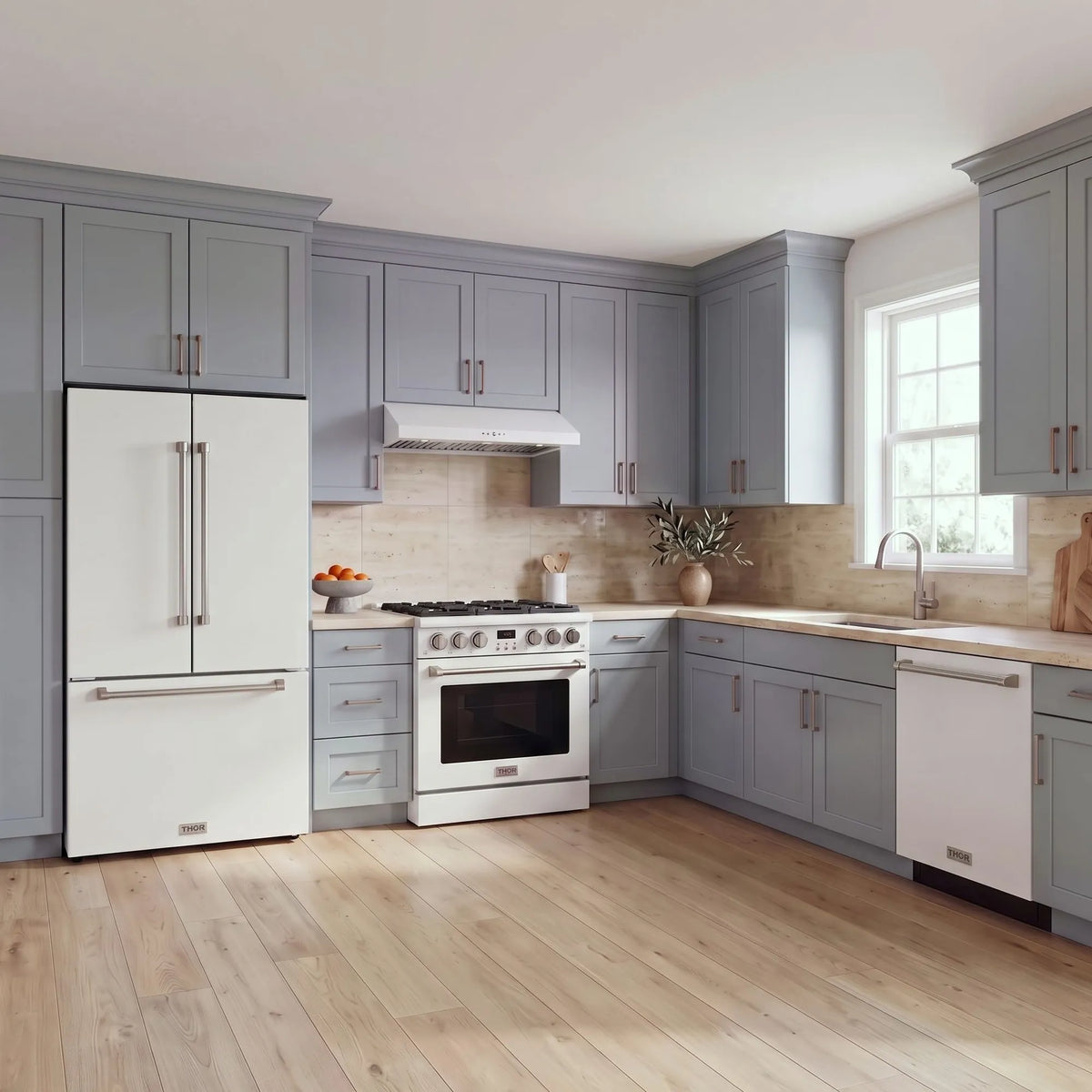 Thor Kitchen A-Series white kitchen with a 36-inch gas range, under-cabinet hood, French door refrigerator, dishwasher