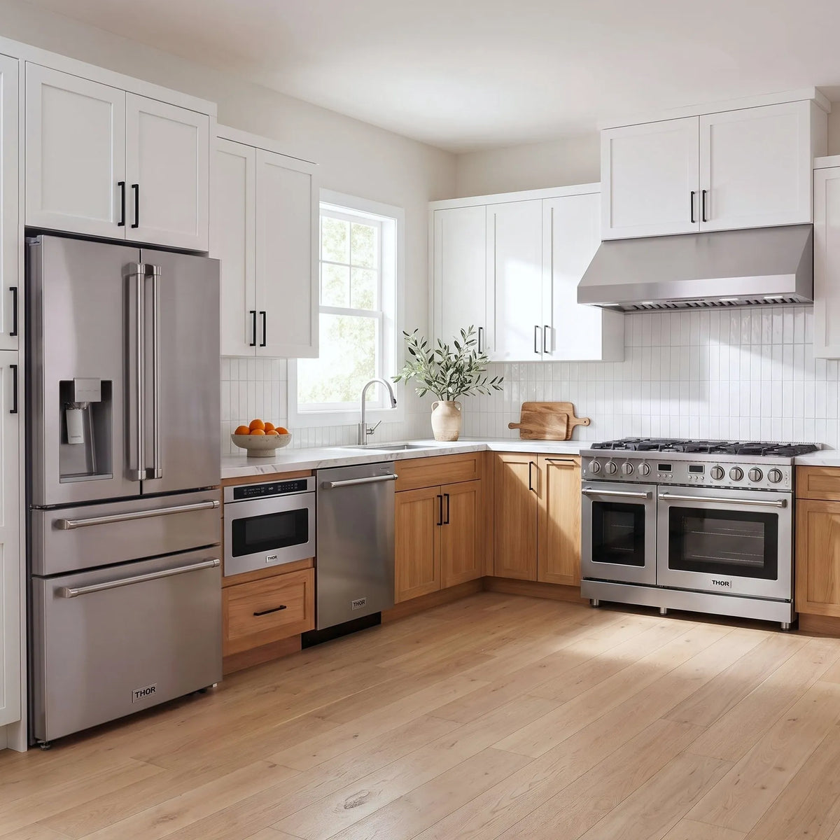 Thor Kitchen A-Series stainless steel kitchen with a 48-inch gas range, under-cabinet hood, French door refrigerator, dishwasher and microwave drawer